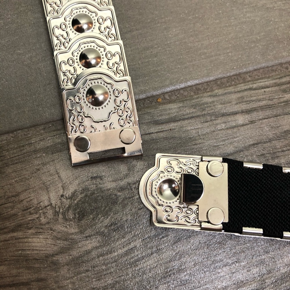 Gorgeous silver plated belt with elastic back. EC